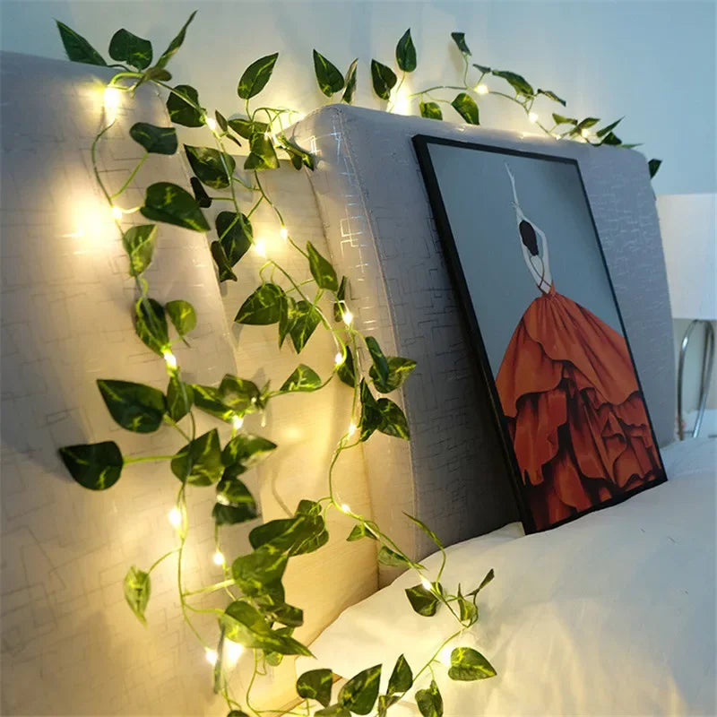 LED Garland – Decorative string lights with artificial leaf vine for a cozy ambiance.
