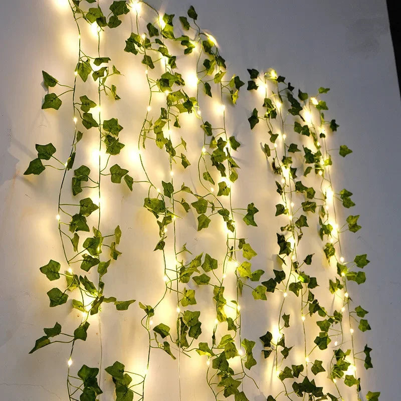 LED Garland – Decorative string lights with artificial leaf vine for a cozy ambiance.